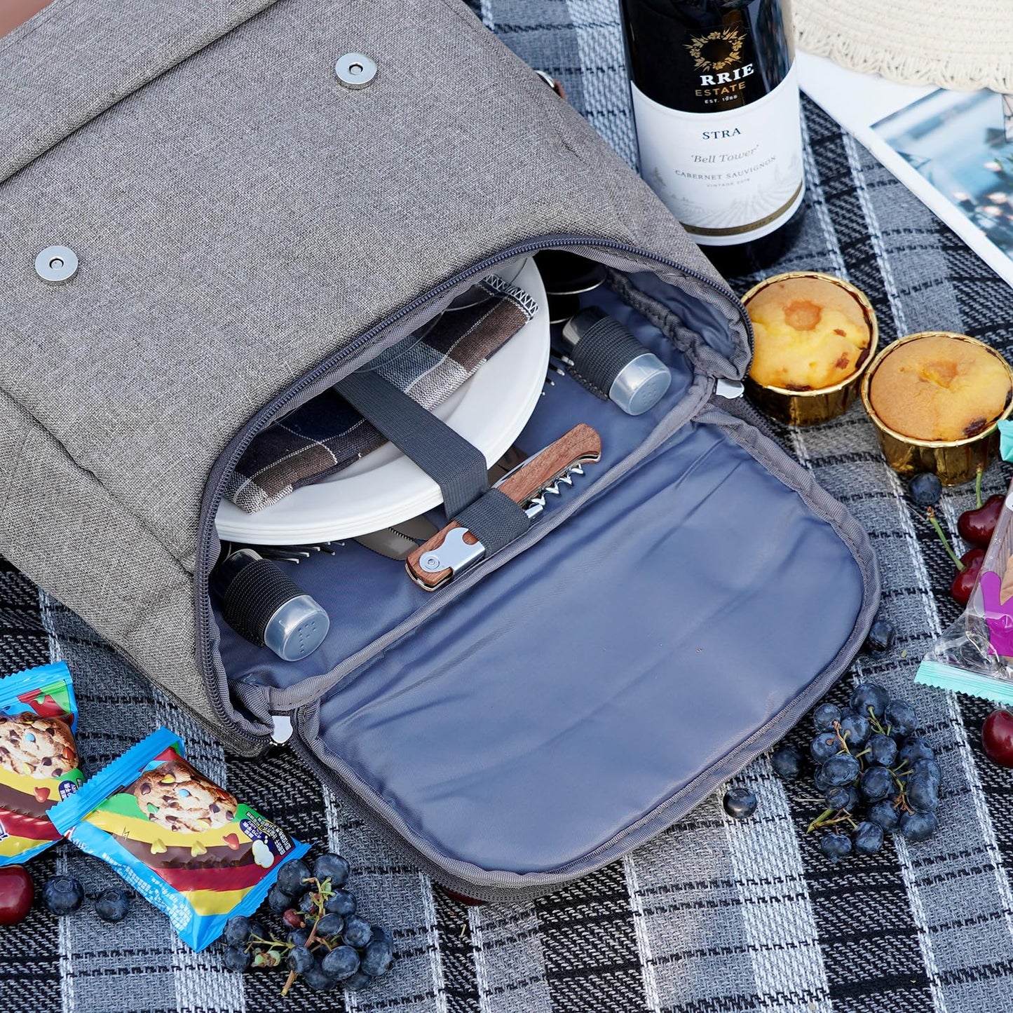 HappyPicnic insulated picnic backpack for 4 people with complete tableware set, spacious cooler compartment, bottle holders, and large waterproof picnic blanket.