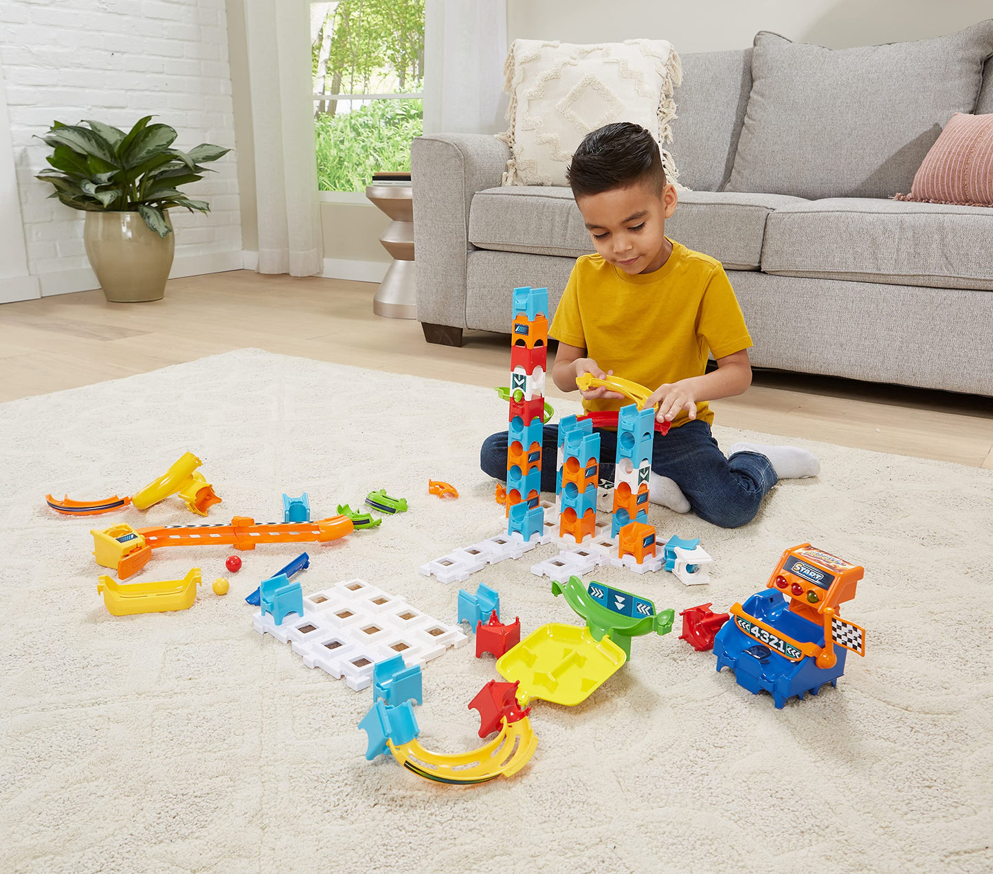 VTech Marble Rush - Racing Set M200 E - Interactive marble run set with lights and sounds, exciting track elements, building options, and path configurations - For kids aged 4-12.