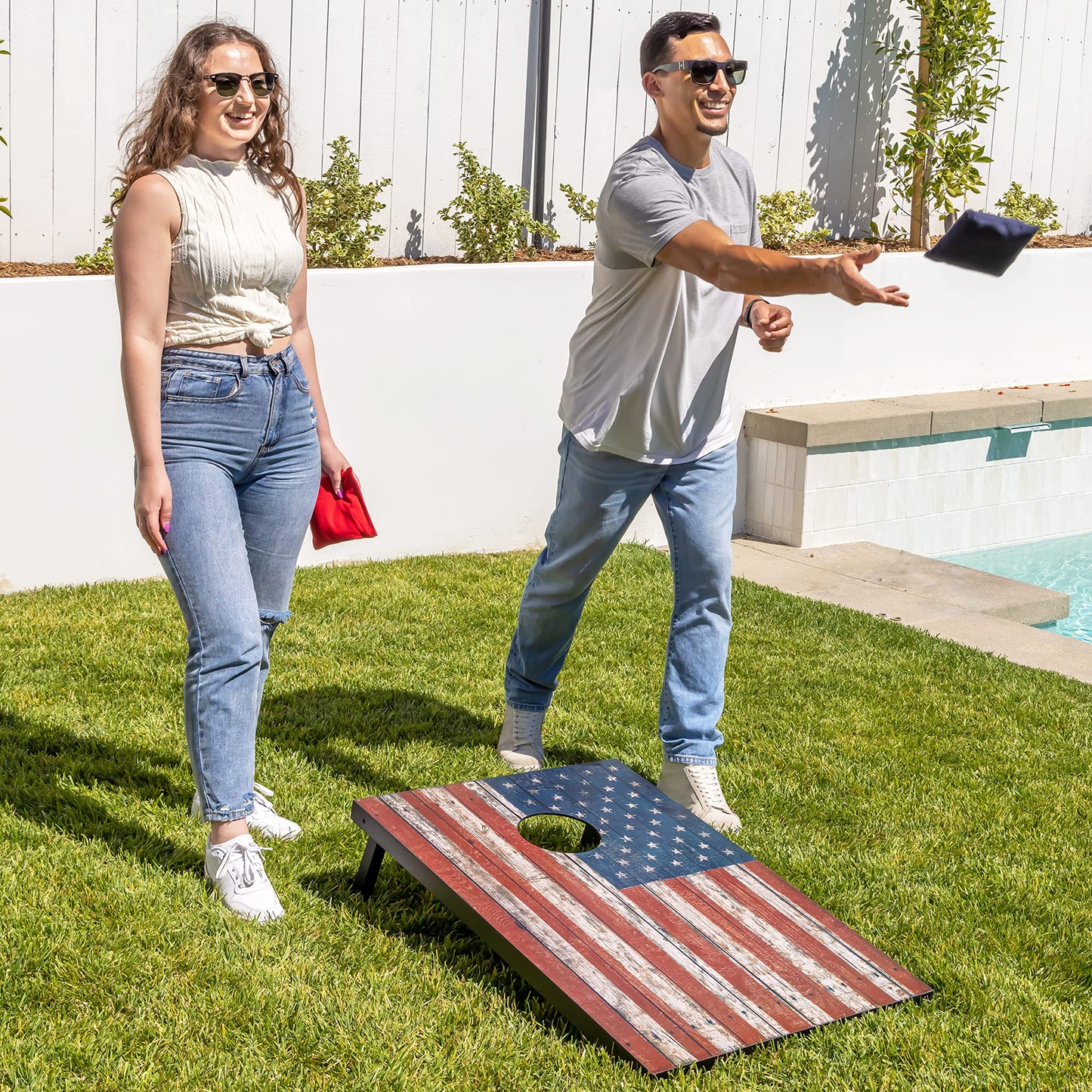 GoSports Cornhole Game Set with American Flag design, 90 x 60 cm, includes two 90 x 60 cm boards, 8 bean bags, and carrying case.
