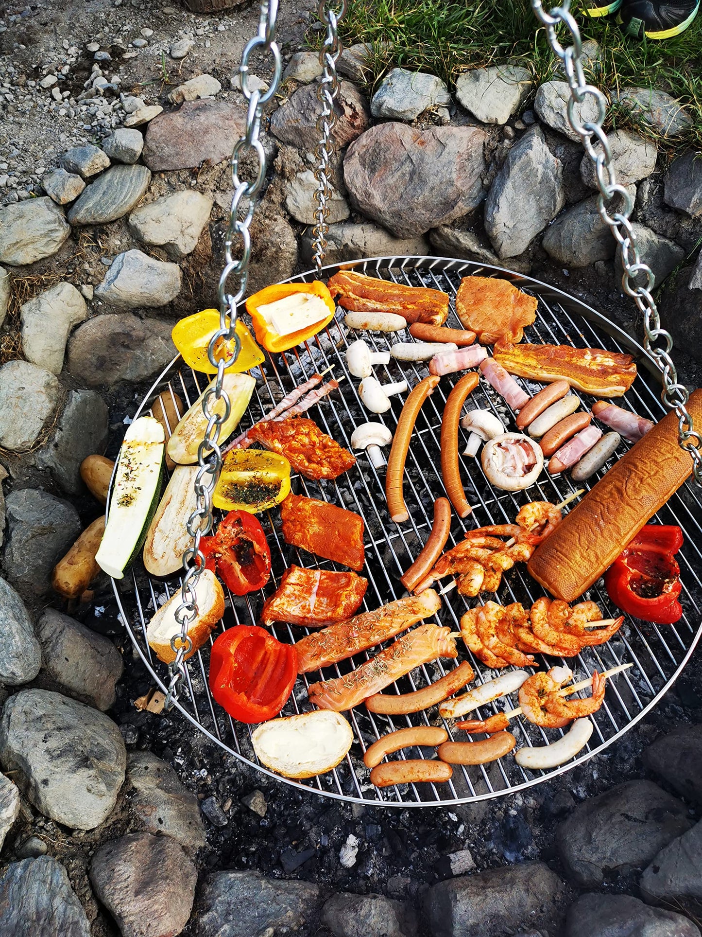 GriHero stainless steel grill grate with a diameter of 70cm for swing grill, grill grid with 3 hanging holes for swing grill grate and fire bowl tripod BBQ grill accessory. Solid 4mm thickness.
