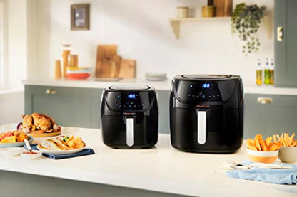 Russell Hobbs 4L Rapid AirFryer with small footprint, 7 cooking functions, and 10 programs. SatisFry is dishwasher safe, reaches up to 220°C, and is oil-free for frying, grilling, baking, and roasting. Model 27160-56.