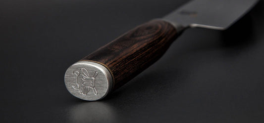 KAI Shun Premier Tim Mälzer Japanese utility knife 10 cm blade length - VG-MAX core 61 (±1) HRC, 32 layers of polished damascus steel - medium brown pakkawood handle - hammer finish surface - Made in Japan