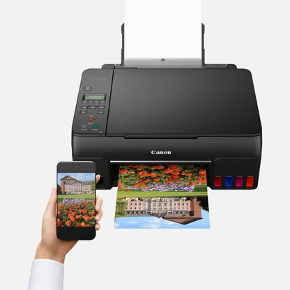 Canon PIXMA G650 MegaTank printer. Inkjet printer with scanner and copier functions. 4,800 x 1,200 dpi resolution, photo printing up to 4x6 inches. Features a LCD display, WLAN, wireless printing, and auto power on/off. Color: black.