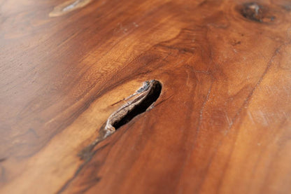 Invicta INTERIOR at riess-ambiente.de offers the tree trunk stool ROOT. Made of solid teak root wood, this versatile piece serves as a stool, side table or footrest in natural style.