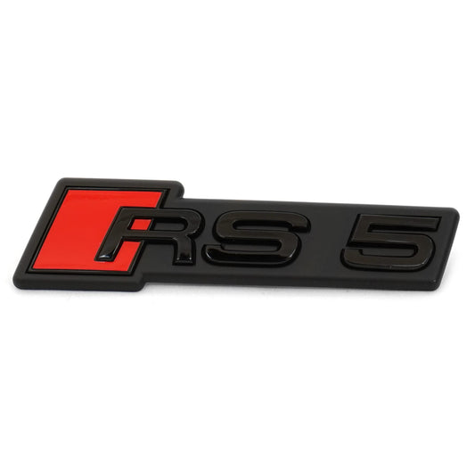 Audi 8W6853736GT94 RS5 grille badge emblem, black/red, for facelift from model year 2020.