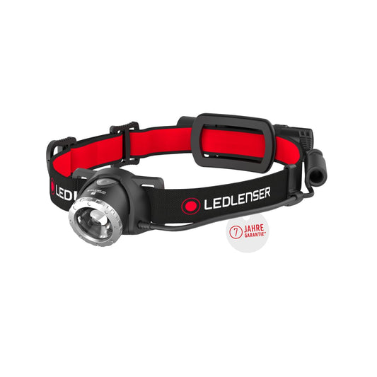 Ledlenser H8R headlamp with rechargeable lithium 18650 battery, 600 lumens, focusable, up to 120h runtime, red taillight, swiveling, USB charging cable.