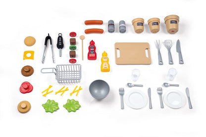 Smoby - Outdoor garden play kitchen - includes grill, sink with water pump function, and many accessories, for children ages 3 and up.