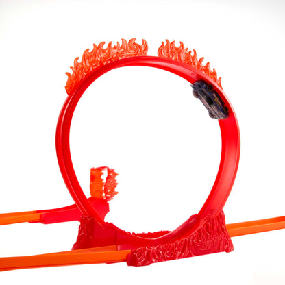 Hot Wheels track set, fire-themed track set with one Hot Wheels vehicle, 16 track and stunt components in stackable toy storage box, HMC04.