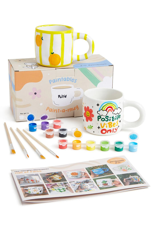 Pott'd Paintables cups for adults, ceramic painting set with cups, paints, brushes, and painting inspirations for painting the cups yourself.
