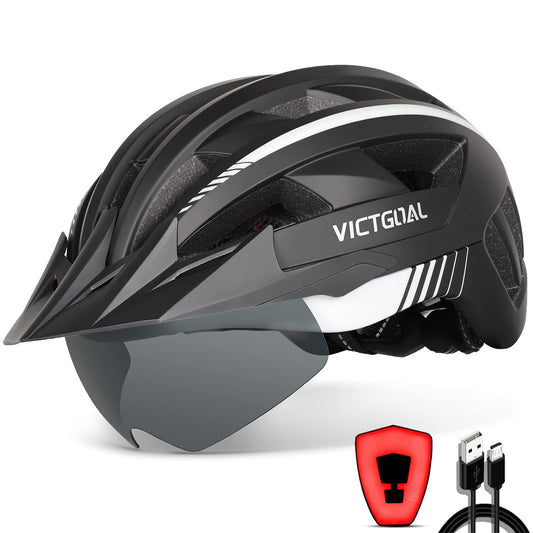 VICTGOAL bike helmet for men and women with removable magnetic goggles visor. Breathable with 21 ventilation channels. Adjustable for head size 57-61cm. Black and white color.