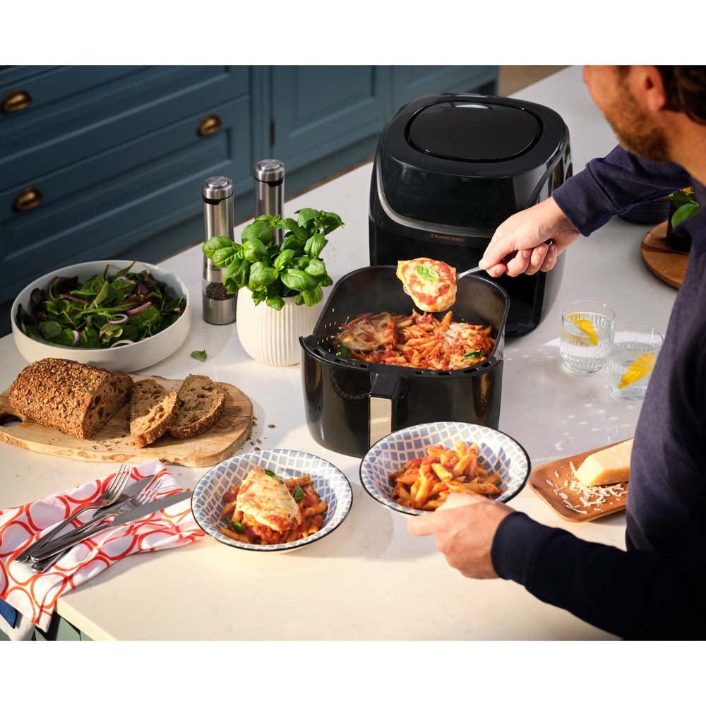 Russell Hobbs XXL 8L Rapid AirFryer with compact design, 7 cooking functions, 10 programs. SatisFry technology is dishwasher safe, reaches up to 220°C, and allows for oil-free frying, grilling, baking, and roasting. Item number: 27170-56.