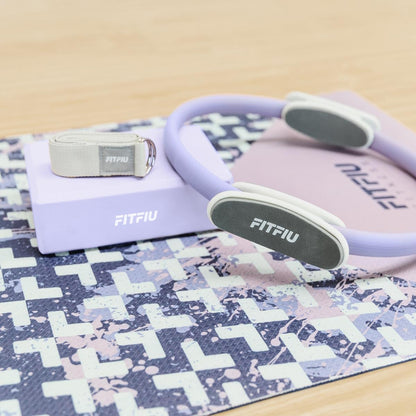 Fitfiu Fitness KITWELL-601-6-Pack Yoga and Pilates accessories in Purple with mat, ring, block, foot massager, massage stick, and yoga strap. Unique geometric design.