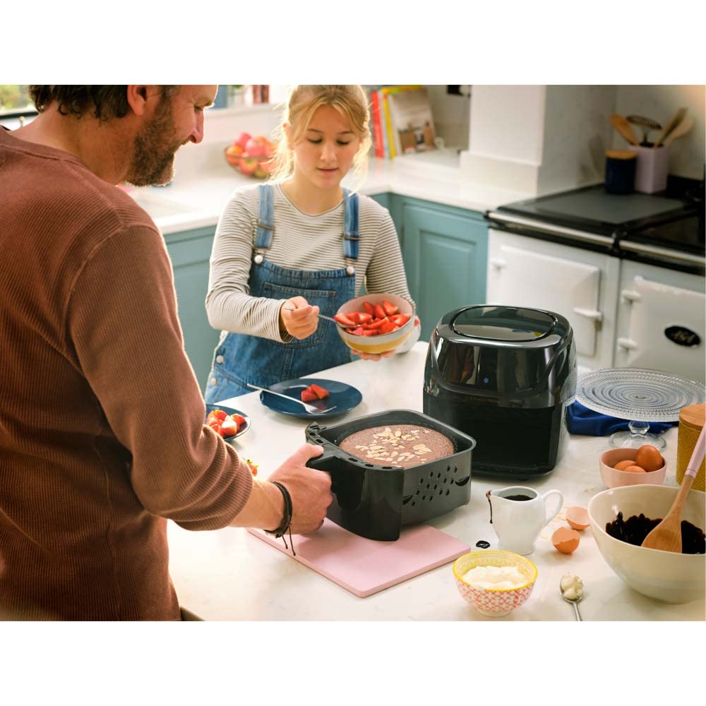 Russell Hobbs 4L Rapid AirFryer with small footprint, 7 cooking functions, and 10 programs. SatisFry is dishwasher safe, reaches up to 220°C, and is oil-free for frying, grilling, baking, and roasting. Model 27160-56.