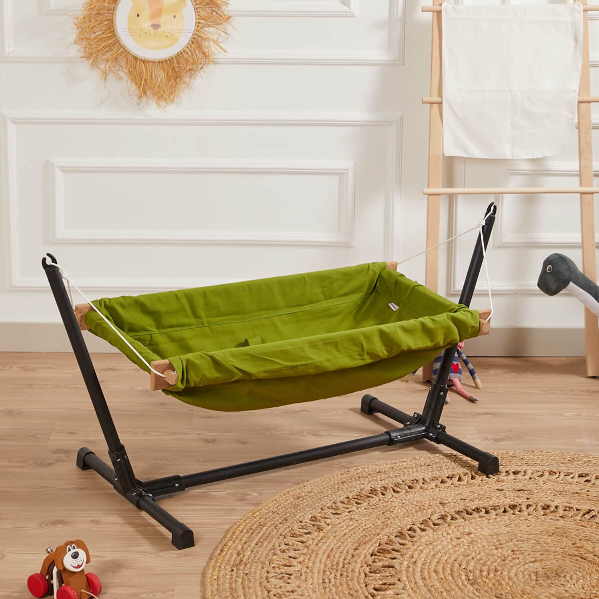 Baby Hammock with Stand. Made from 100% cotton, this travel-friendly baby hammock comes with a wooden swing stand for your little one to rest and play comfortably.