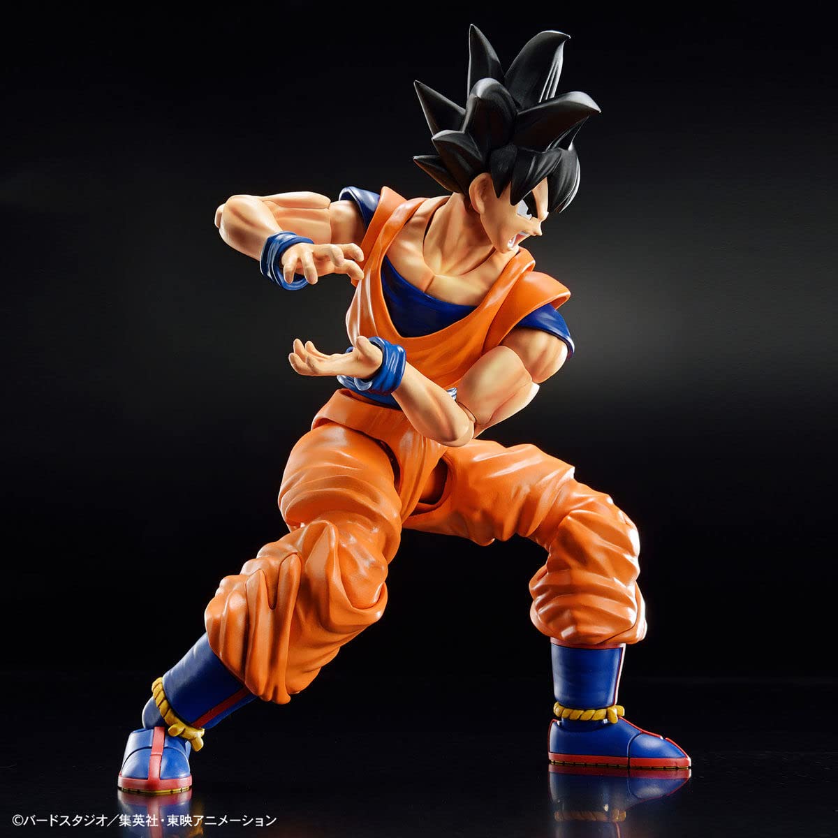 Dragon Ball - Figure Rise Standard Son Goku (New Spec Ver.) - Model kit, Orange/Sunset Chevron pattern.