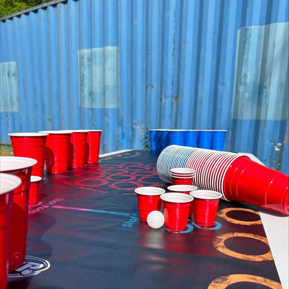 Beer Pong mat - Beer Pong table on the go | + 50 Beer pong cups (25 red & 25 blue, 16 oz) + 10 mini shot red cups + 6 balls | Comes with 4 games | 175 x 59 cm, waterproof and tear-resistant