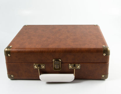 GPO Attache turntable in briefcase-style with vinyl player and built-in speakers, vintage brown.