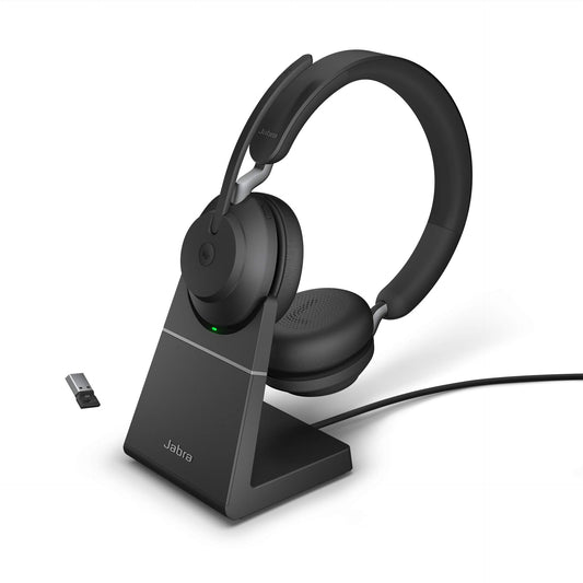 Jabra Evolve2 65 is a wireless PC headset with a charging stand. It has noise-canceling, Microsoft Teams certification, stereo sound, and a long-lasting battery. The set includes a USB-A Bluetooth adapter. Available in black.