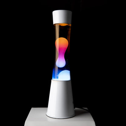FISURA - Multicolored lava lamp. White base and glass with multicolored gradient effect. Lamp for relaxation. Comes with spare bulb. 11 cm x 11 cm x 39.5 cm.