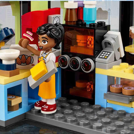 LEGO Friends Heartlake City Café, kids' toy, bakery playset, gift idea for girls and boys ages 6+, includes 3 minifigures and a dog figure 42618