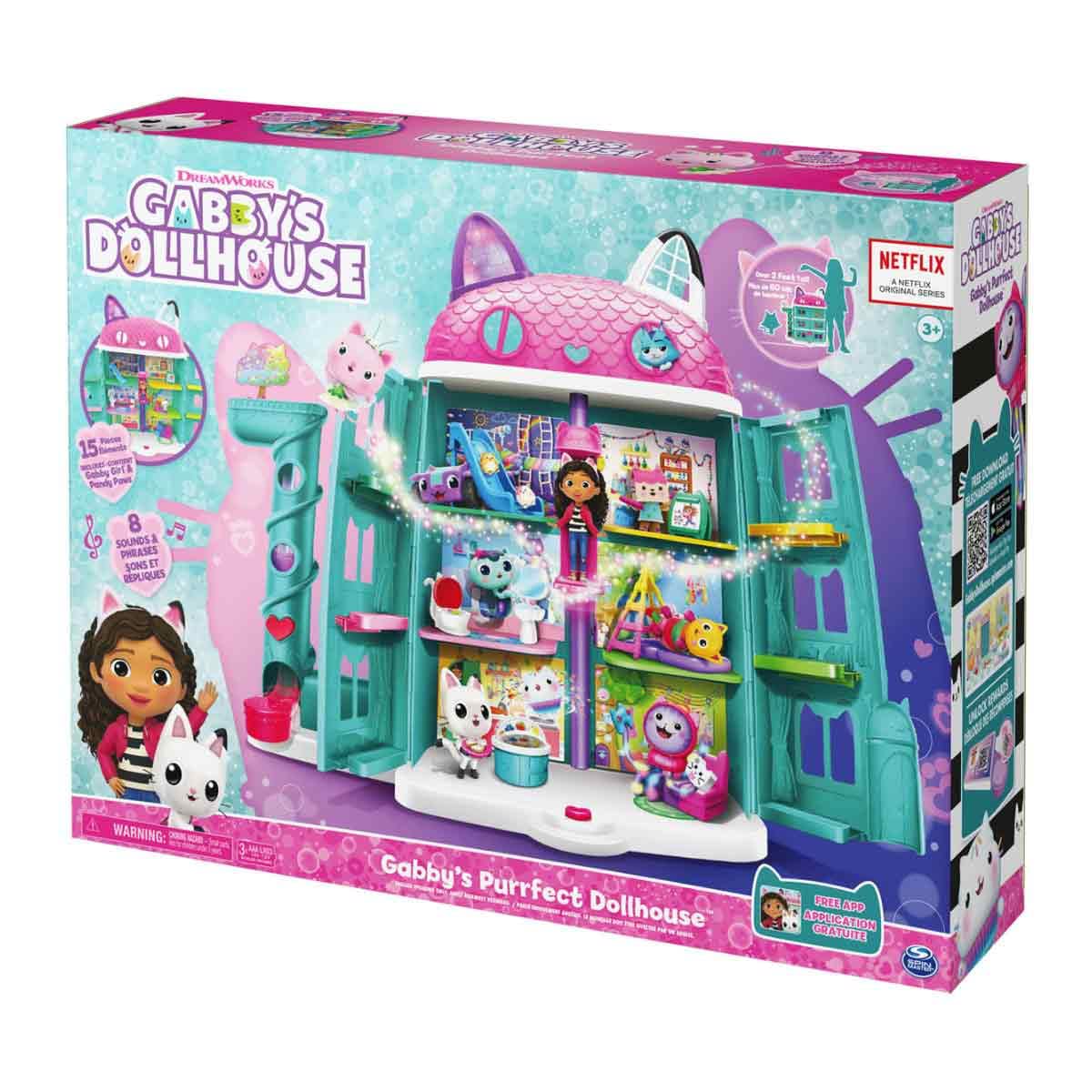 Gabby's Dollhouse, a Purrfect dollhouse over 60cm tall with Gabby and Panda Paws figures, 8 furniture pieces, 3 accessories, 2 surprise boxes, and sounds. A gift for children 3 years and older.