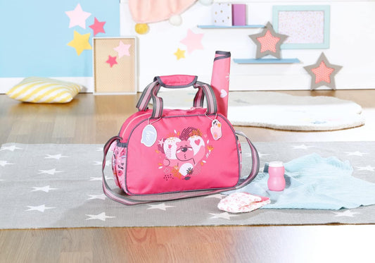 Zapf Creation 832455 BABY born Changing Bag - Doll changing bag in pink and grey including changing mat, diaper, and powder compact.