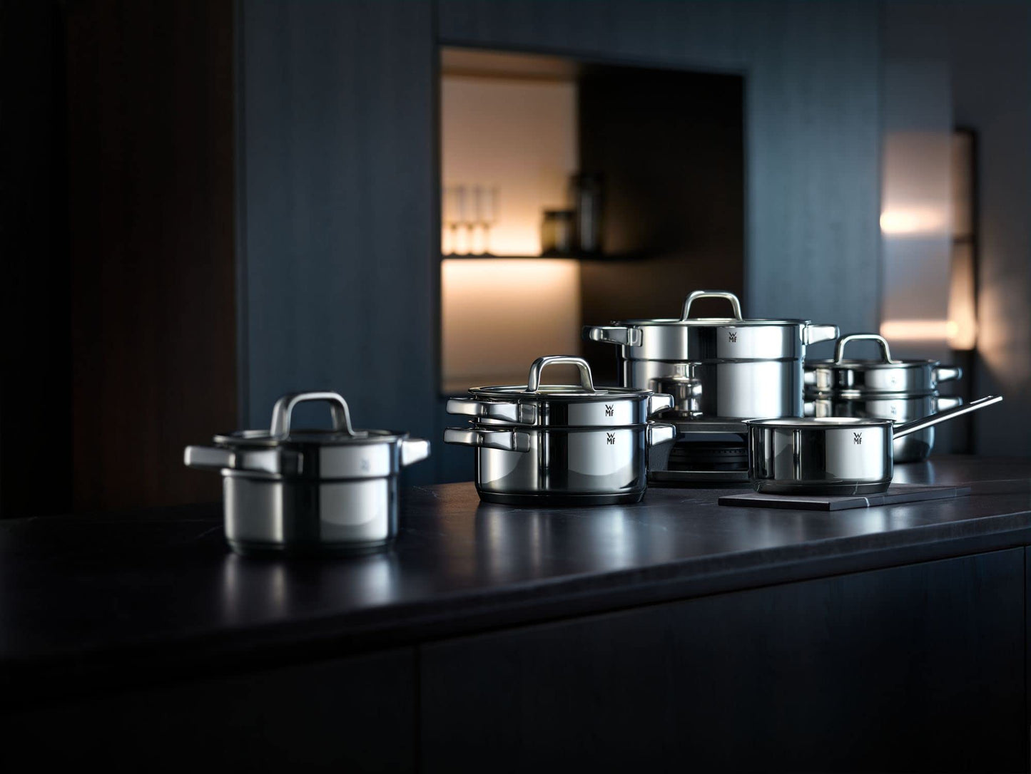 WMF Set 3-piece Compact Cuisine pot set Induction 4-piece with glass lid and Devil pan set Induction 2-piece and Mister X pot holder Stainless steel foldable 19 x 19 cm.