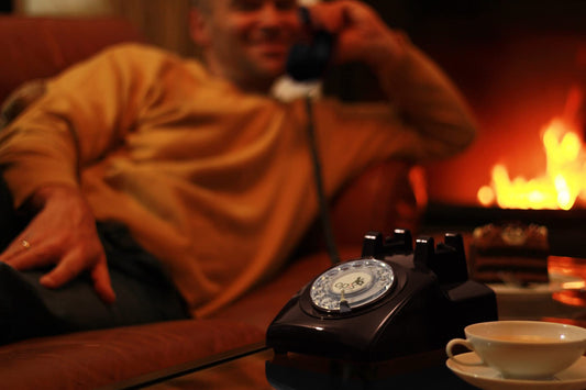 60s Cable Phone: The retro telephone with rotary dial, the nostalgic rotary dial phone, and vintage corded phone for classic calls in black.