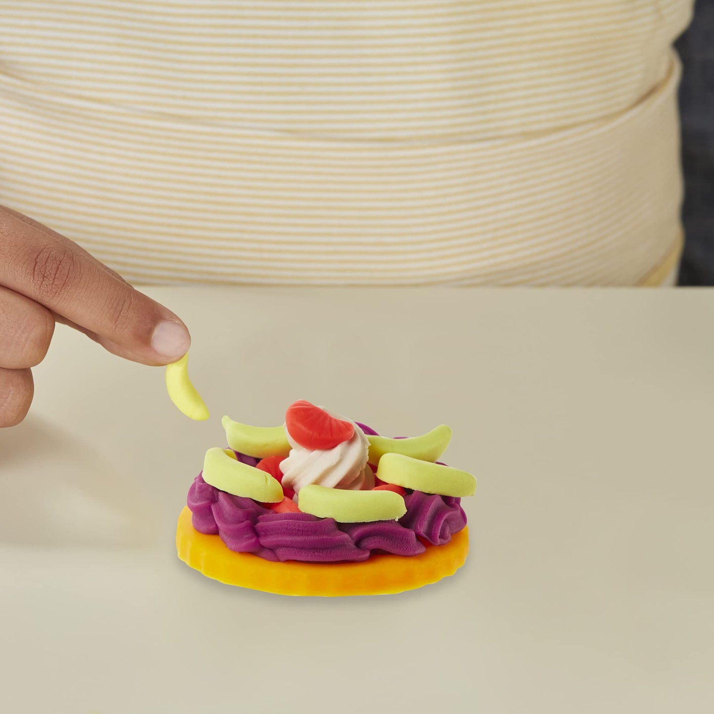 Play-Doh Kitchen Creations Kitchen Machine and Cookie Party Playset for kids aged 3 and up, comes with 15 cans.