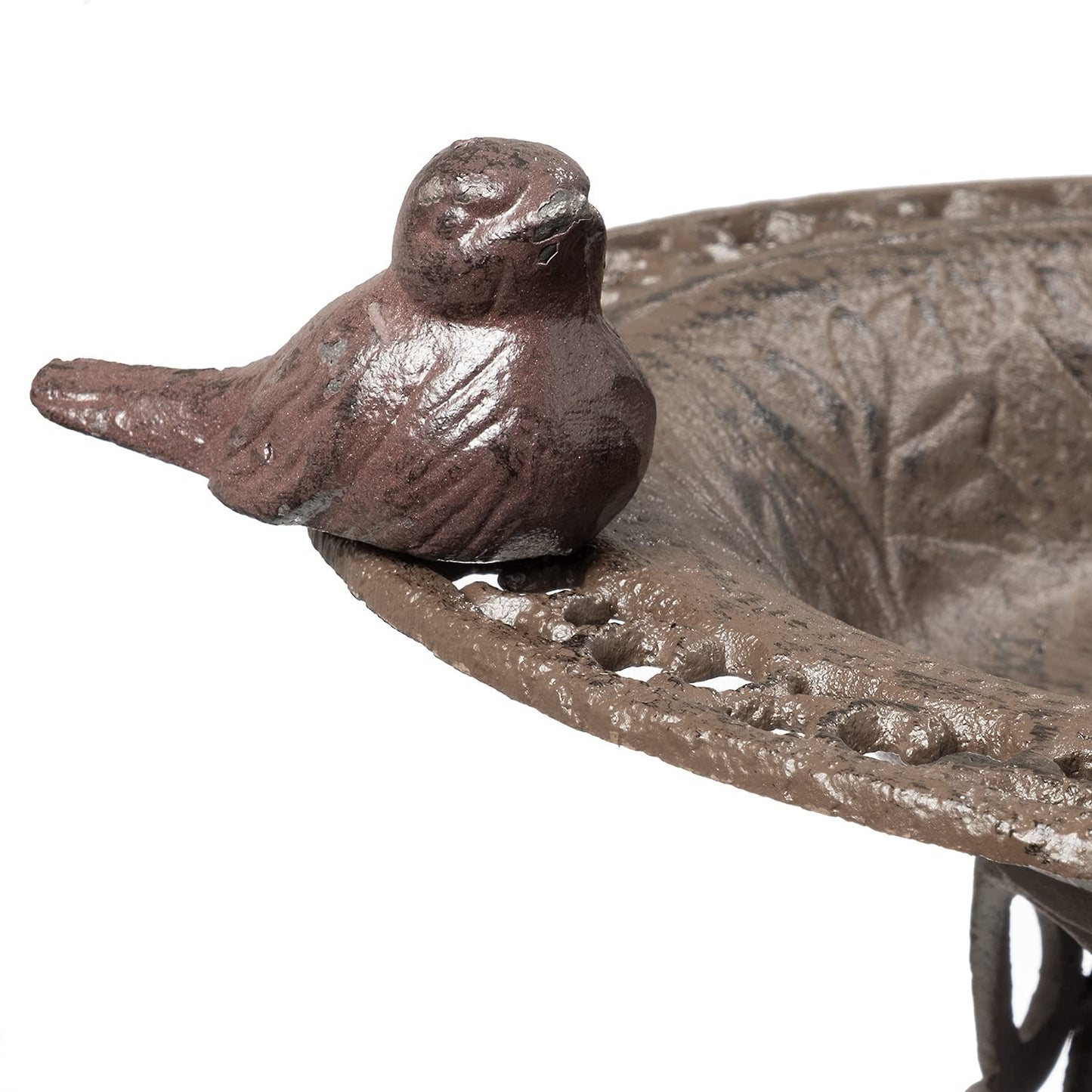 Large bird bath with decorative birds made of cast iron. Metal water bowl for feeding and garden decoration.