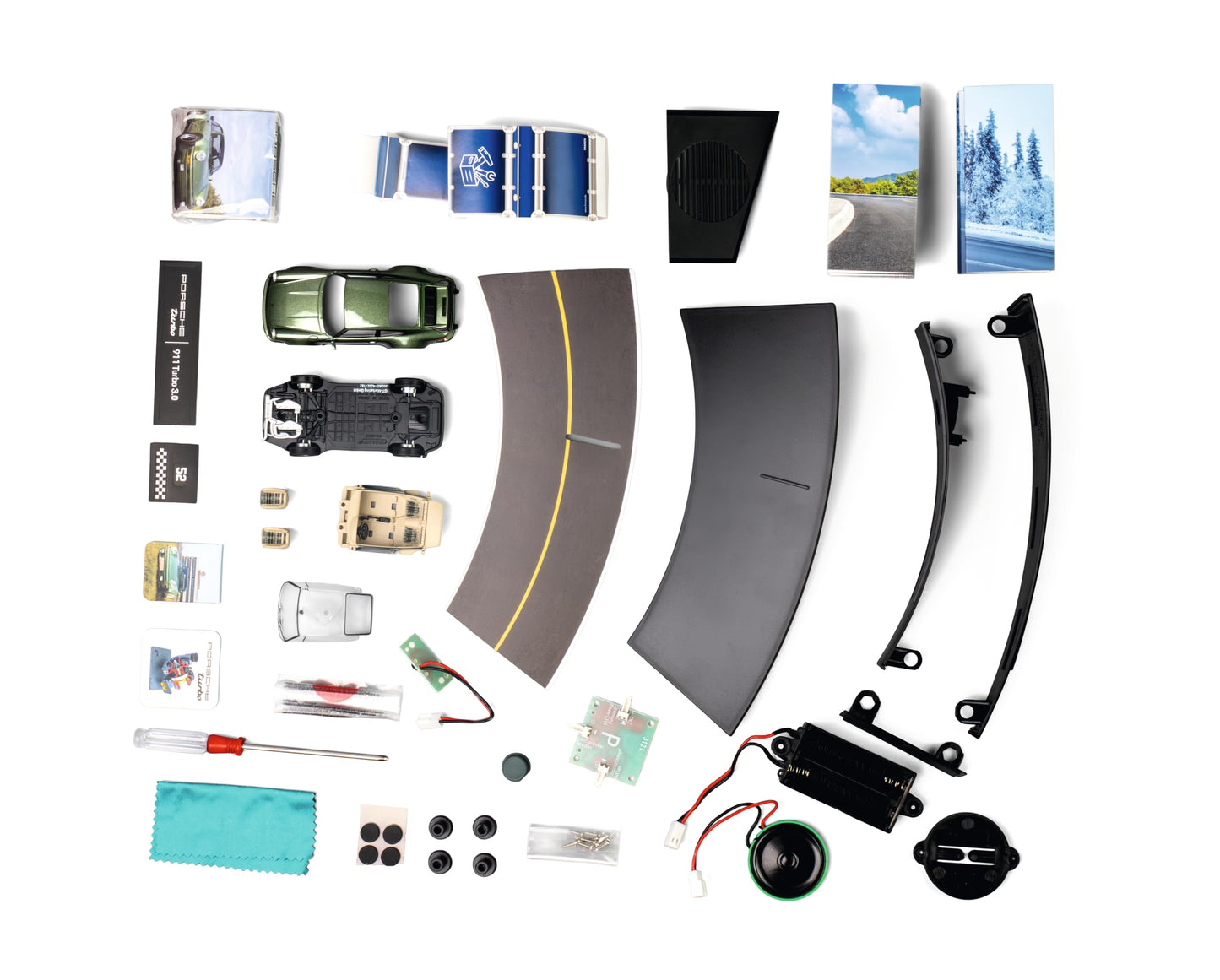 FRANZIS 55109 - Porsche 911 Turbo Advent calendar light green, metal model kit in 1:43 scale, including sound module and 52-page companion book.