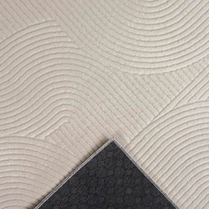 the Rio carpet - modern and soft rug for living room or bedroom with non-slip backing and 3D effect. Fluffy surface, easy to care for and durable. Cream color, 200 x 280 cm.