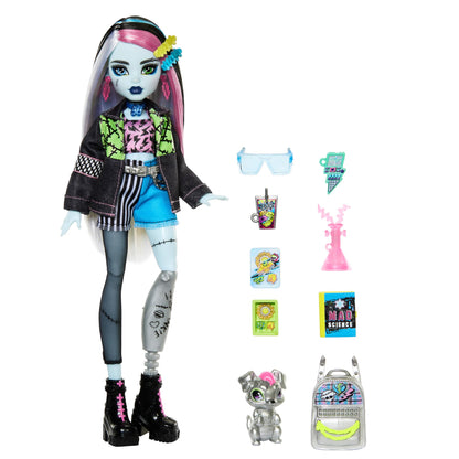 Monster High Frankie Stein doll in denim jacket and shorts, includes her dog Watzie and accessories like a backpack, snack, and notebook. HXH73.