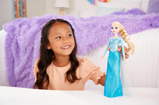 Mattel Disney Frozen Singing Elsa Fashion Doll in movie-inspired outfit sings "Let It Go" in English, French, German, Italian, JDL58