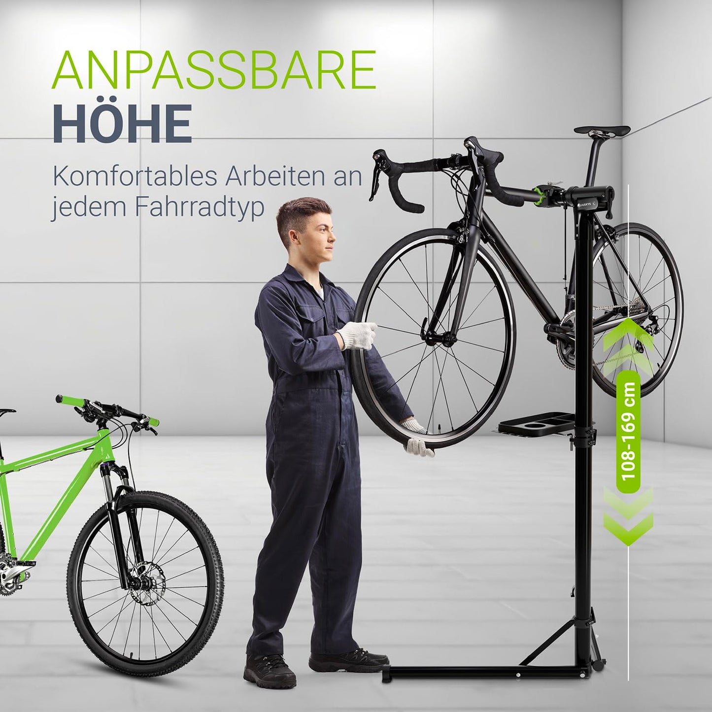 Juskys Bike Repair Stand, up to 50 kg for E-bikes, foldable & height adjustable, clamp head rotates 360°, rubber coating & tool tray, heavy-duty stand for 24 to 29 inch bikes.