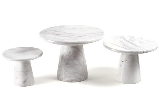 White marble design etagere as a serving platter or cake plate for the festive table.