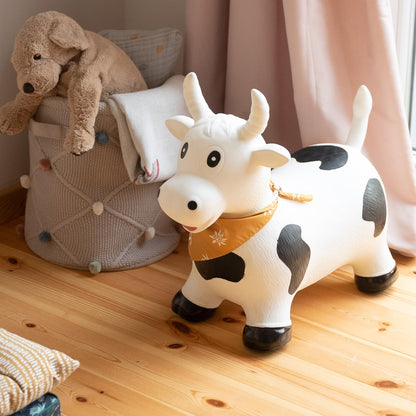 Childhood Hopping Animal for Kids, subtle and modern colors, lovely details and high quality, includes air pump, Cow.