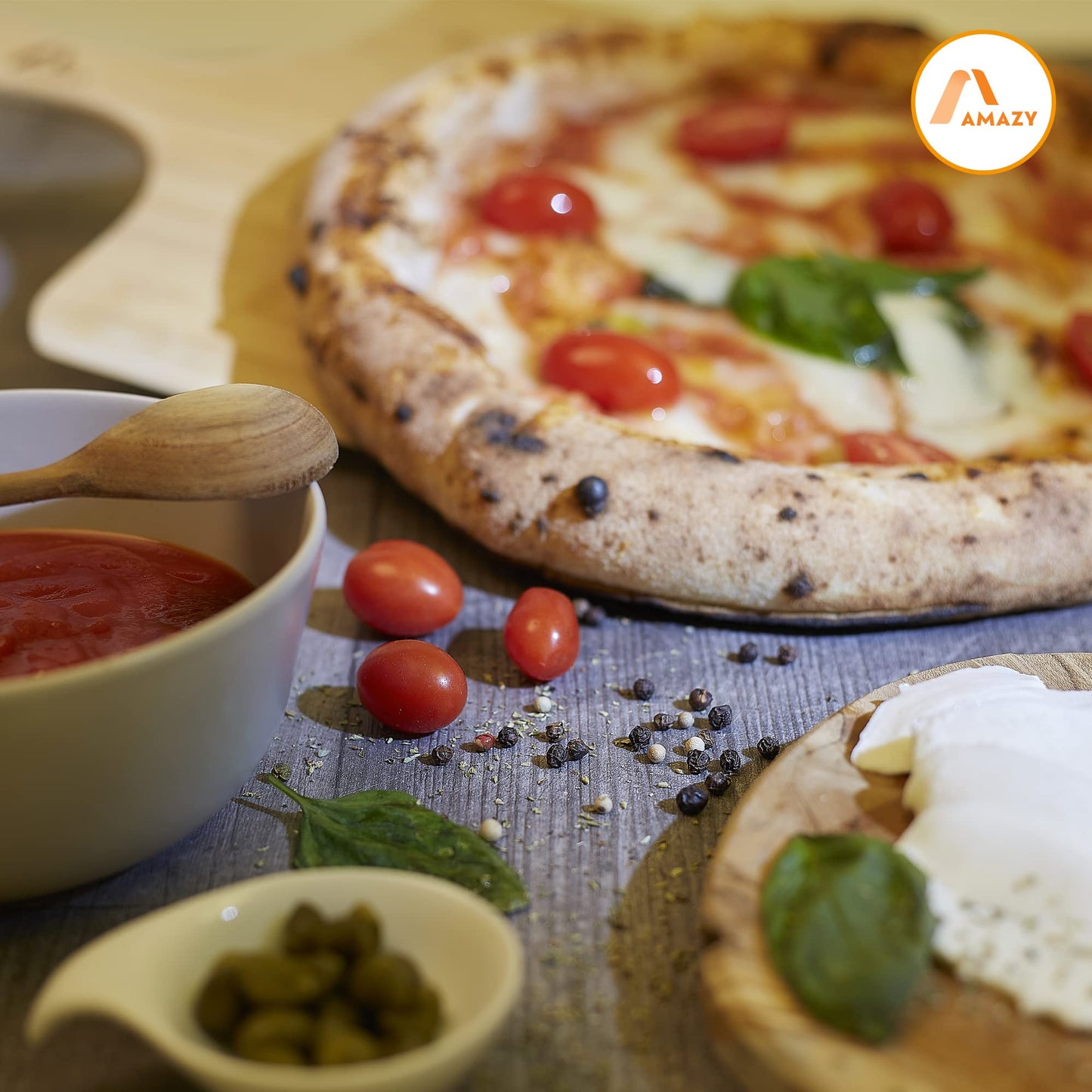 Amazy pizza stone including bamboo pizza peel, parchment paper, and insert - The ultra heat-resistant bread baking stone gives your pizza the original Italian flavor of crispy stone oven pizza.