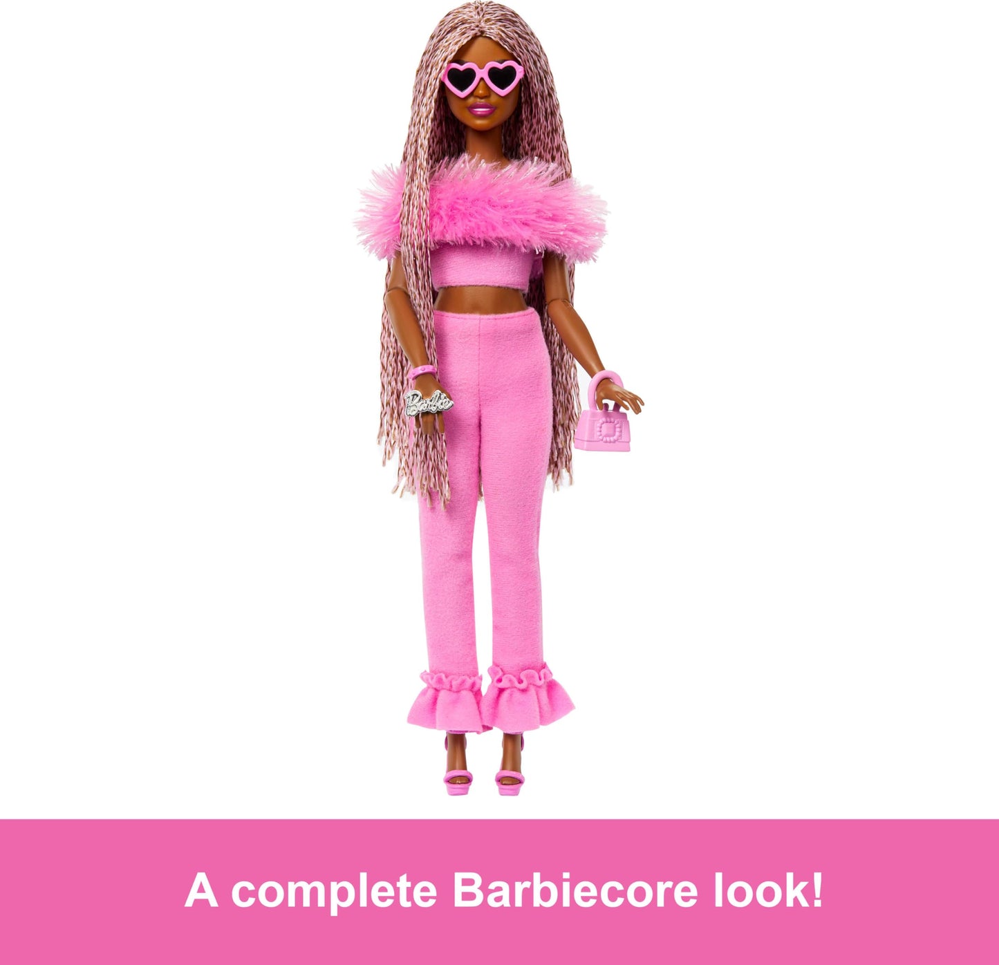 Barbie Deluxe Style Doll No. 4 with Barbiecore outfit, pink and brown braided pigtails, soft pink top with fuzzy collar and matching pants, plus accessories, HYV28.