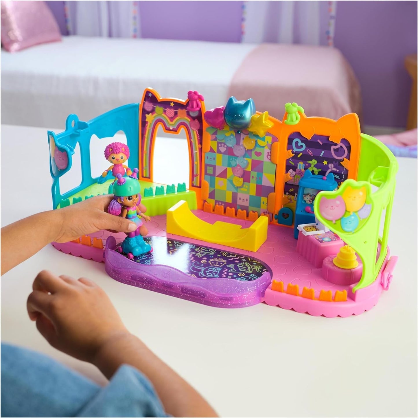 Gabby's Dollhouse, Party Room Playset, Skate Park Attic Room with Gabby and Marty figure, furniture, and accessories, for ages 3 and up.