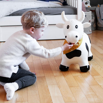 Childhood Hopping Animal for Kids, subtle and modern colors, lovely details and high quality, includes air pump, Cow.