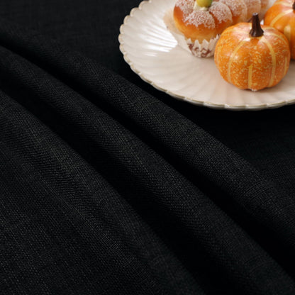Smiry linen-look tablecloth, waterproof with lotus effect, rectangular 140 x 200 cm. Stain-resistant black table cover for easy cleaning and protection.