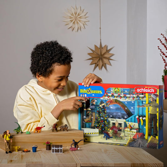 SCHLEICH Dinosaurs | Advent Calendar 2025-98984 | with movable figure Luis, 6 mini dinos, treasure chest & lots of accessories | Dinosaur toy & gift idea for kids aged 5+ | 24 pieces