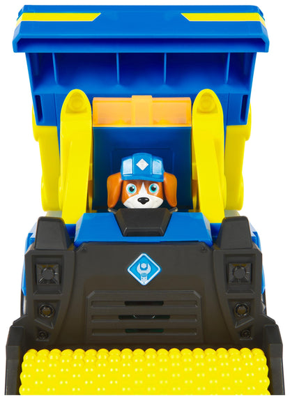 Rubble & Crew - Premium Construction vehicle with a tipping dump truck, leveling roller, lights, and sounds (Deluxe vehicle) and Wheeler figure, toy for children aged 3 years and up.