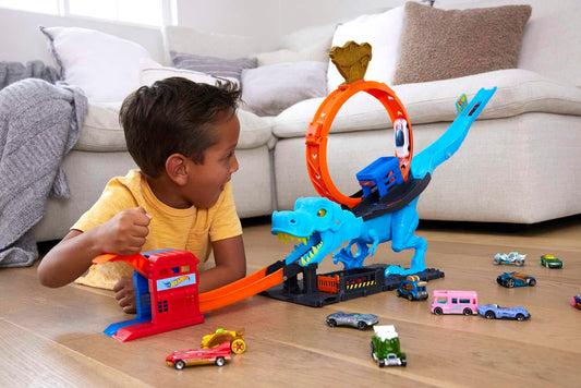 Hot Wheels City T-Rex Attack - Skill through precise timing, police station, loop, dinosaur, cross-eyed, for kids ages 4 and up, HNP77