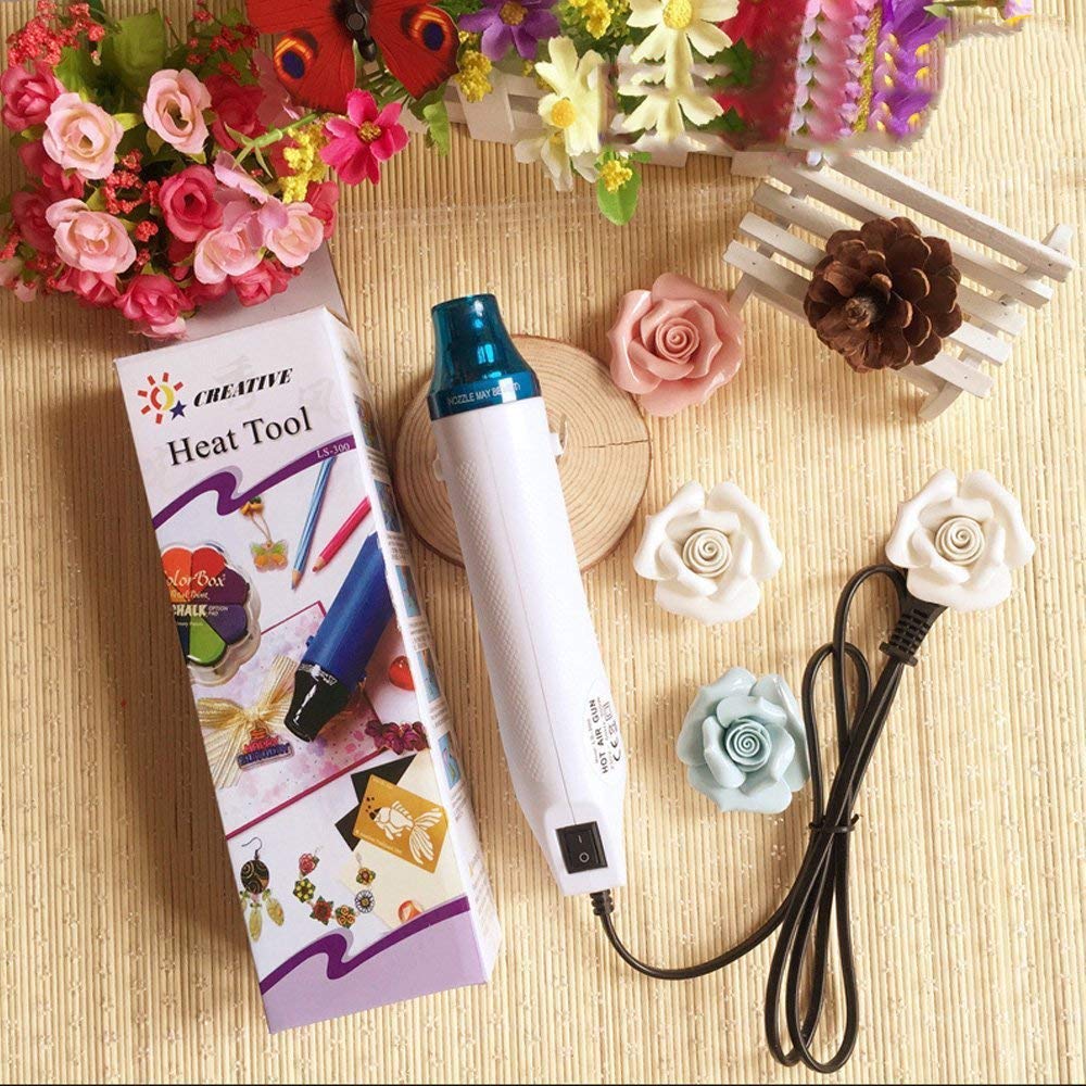Mini 300W electric hot air gun shrink heat tool with embossing powder set. Perfect for drying paint, rubber stamp, and heating small clay works. Ideal for DIY projects.