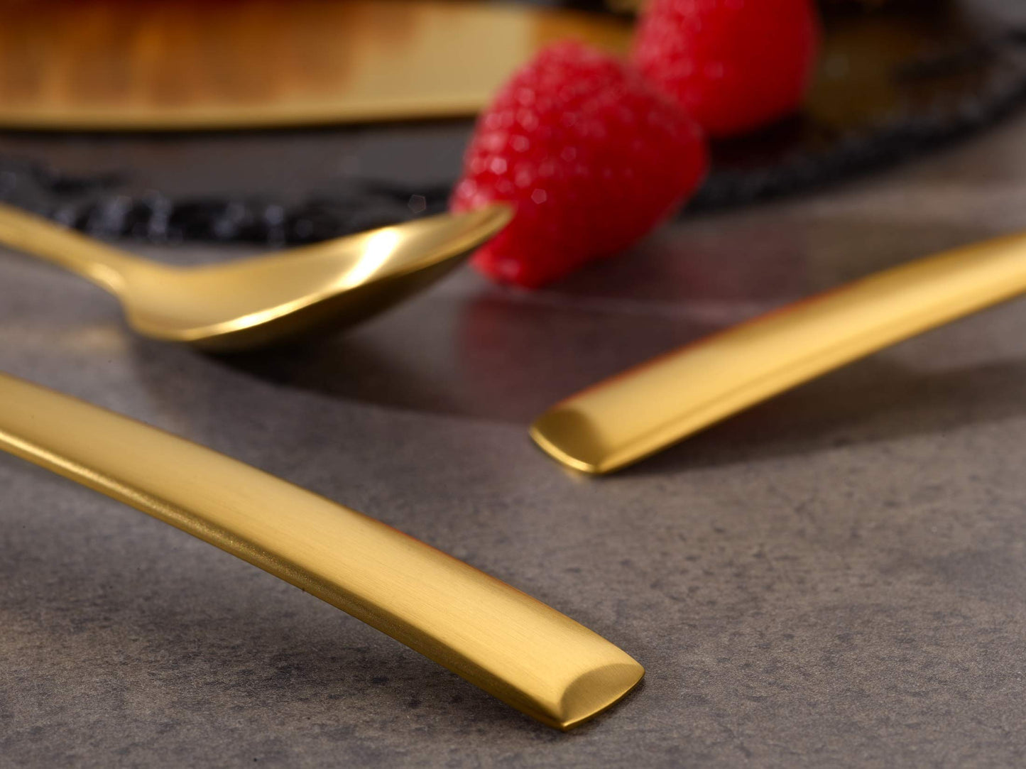 "Avelino" 68-piece PVD gold matte stainless steel flatware set by Echtwerk for 12 people. Includes storage case.