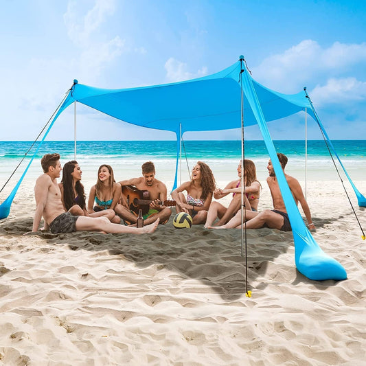 The COMMOUDS sun shade 3M x 3M, UPF50+ beach tent with 4 aluminum poles and sandbags for 6-8 people provides portable sun protection. Easy setup for picnics, outdoor fishing.