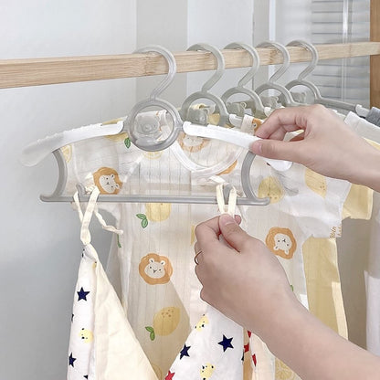HGYZE baby clothes hangers non-slip 20 pieces, 29-37cm Extendable kids hangers with pants stand, plastic & stackable growing hangers great for onesies and children's clothing, Grey + White.
