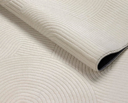 the Rio carpet - modern and soft rug for living room or bedroom with non-slip backing and 3D effect. Fluffy surface, easy to care for and durable. Cream color, 200 x 280 cm.